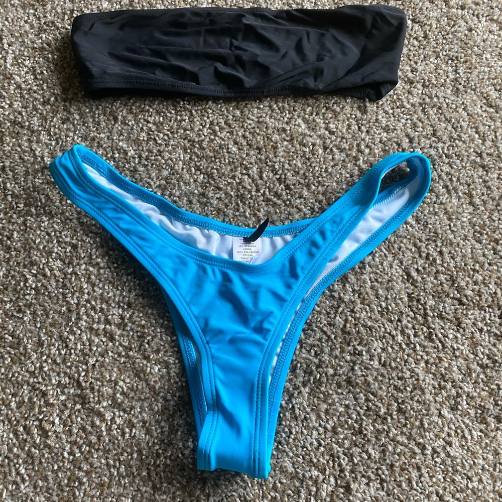 Black top w/ light sky blue bottoms! Never worn!!
